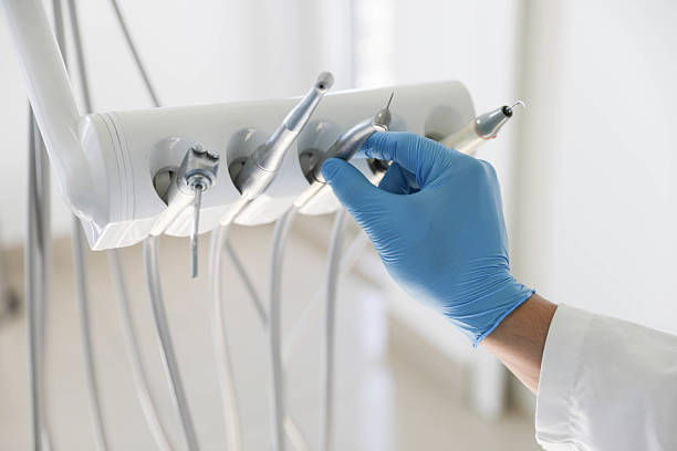 Professional Tooth Extraction technician working in Brunswick County County, NC